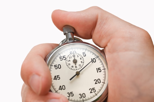 Il pulsante del cronometro preme il dito della mano su sfondo bianco, isolare.