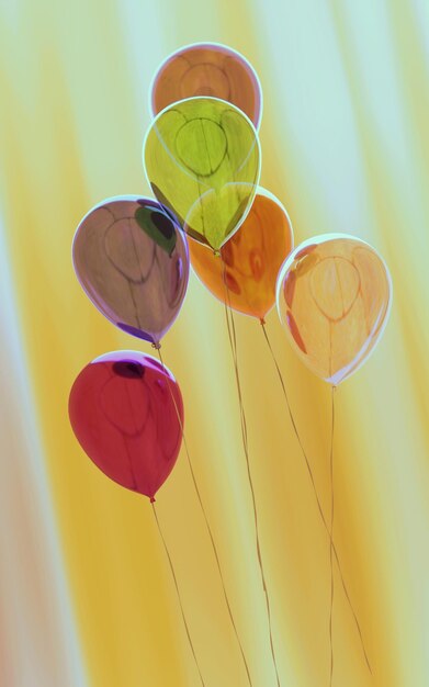 Illustrazione 3d di palloncini colorati su sfondo sfocato sfumato arancione e verde