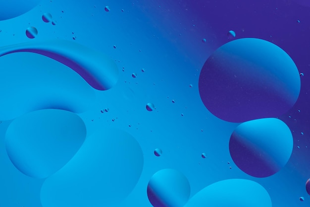 Immagine astratta blu brillante con cerchi sovrapposti