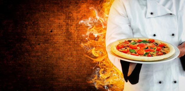 Immagine composita del cuoco unico maschio che offre pizza