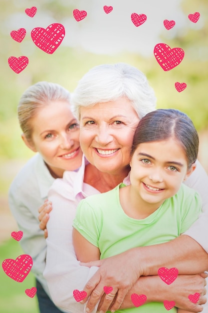 Immagine composita di adorabile famiglia nel parco