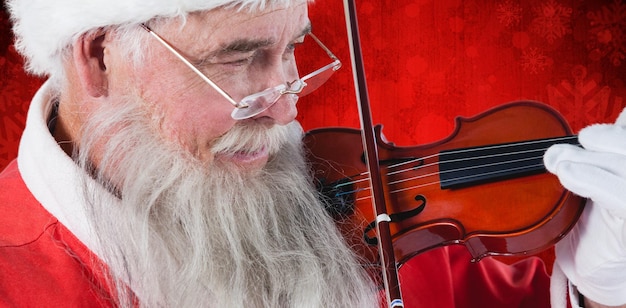 Immagine composita di Babbo Natale che suona il violino