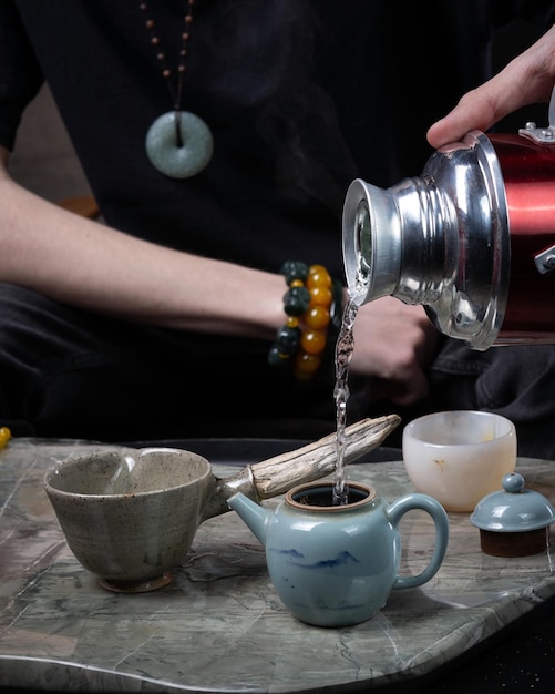 Immagine di stock della tazza da tè teiera orientale