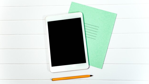 Immagine ravvicinata del quaderno di tablet pc sulla scrivania