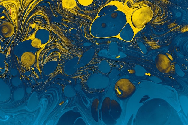 Immagine ravvicinata di una superficie blu e gialla - perfetta per sfondi astratti