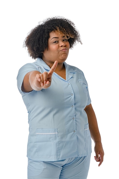 immagine verticale dottoressa afro latina rivolta verso l'alto con il dito guardando la fotocamera e disapprovando