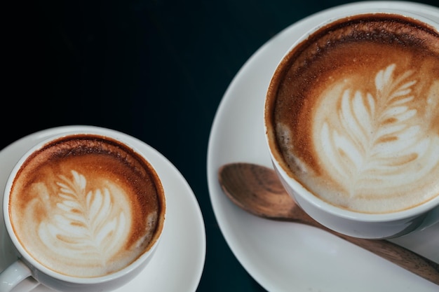 Immagini in stile vintage con tazza di caffè latte art