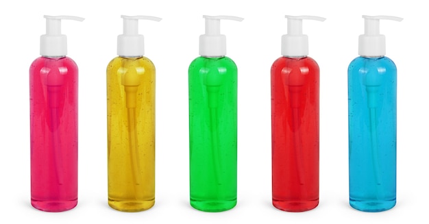 Impostare una bottiglia di plastica vuota verde, gialla, rosa, arancione e rossa utilizzata per shampoo o sapone. Studio girato isolato su sfondo bianco