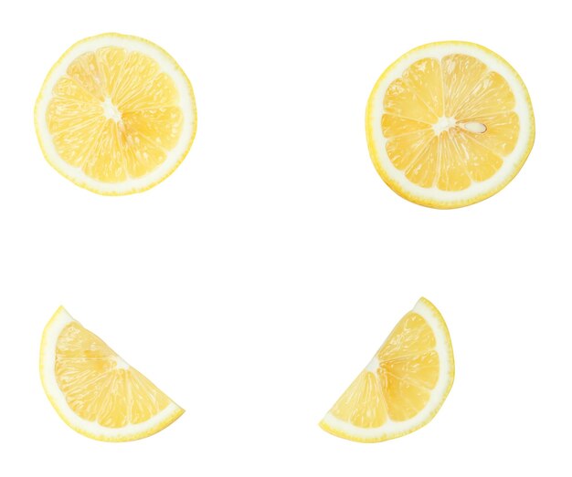 Impostazione superiore di metà di limone giallo fresco con fette o quarti sparsi