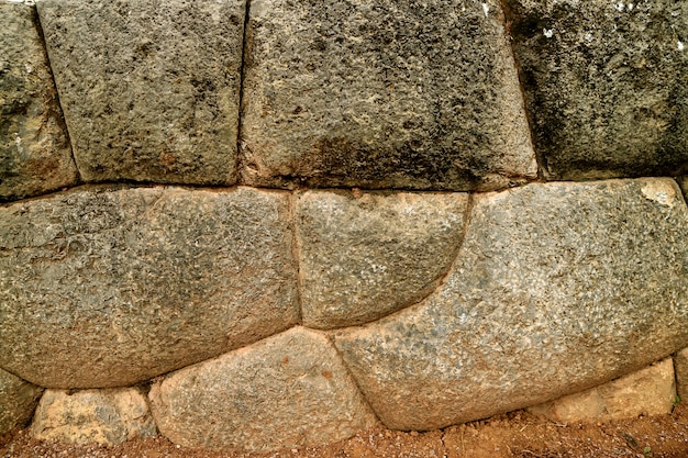 Inca Stonework unico della parete di pietra della cittadella di Sacsayhuaman, sito del patrimonio mondiale dell'Unesco a Cusco, Perù