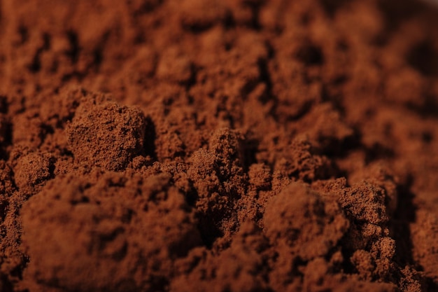 Ingrediente naturale della polvere di cacao marrone del primo piano