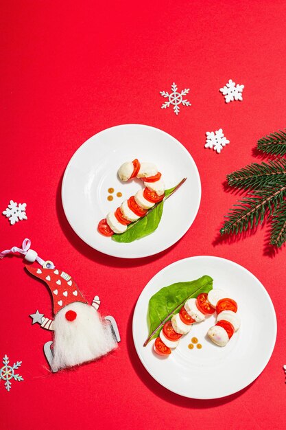 Insalata di caprese sotto forma di canna di caramelle di Natale Decorazione tradizionale di Capodanno