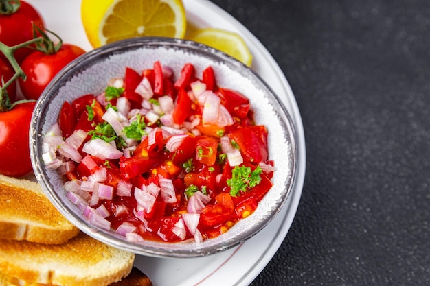 insalata di pomodori salsa cibo piccante pasto fresco spuntino sul tavolo copia spazio cibo sfondo rustico