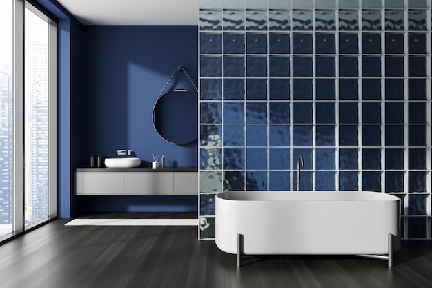 Interno bagno blu con vasca e lavandino