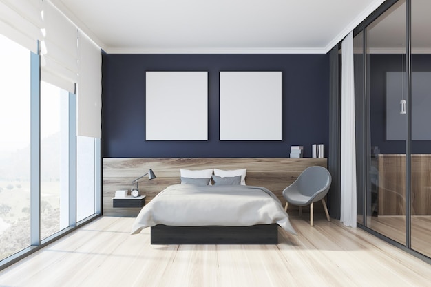 Interno camera da letto blu con pavimento in legno, due poster quadrati e un letto matrimoniale sotto di essi. Rendering 3d mock up