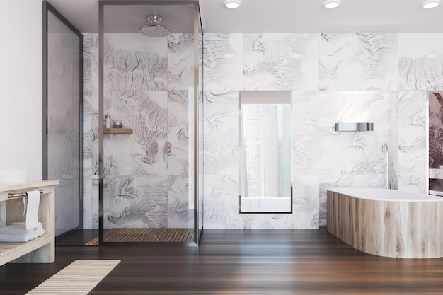 Interno del bagno in marmo grigio con una vasca da bagno in legno, un doppio lavandino e uno specchio alto.