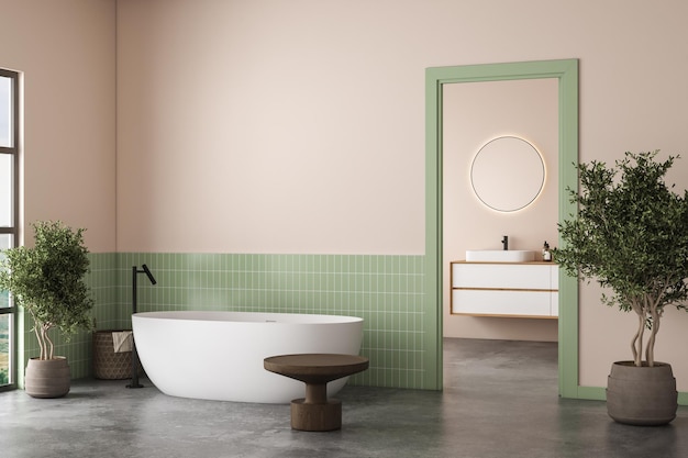 Interno del bagno moderno con piastrelle verdi e pareti beige pavimento in cemento doppio lavabo bianco su piano di lavoro in marmo con specchi ovali sopra di esso e comoda vasca bianca rendering 3d