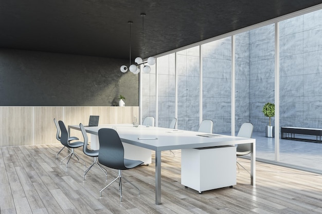 Interno di sala riunioni contemporanea in legno e cemento con finestre panoramiche in vetro tavolo con dispositivi di rendering 3D