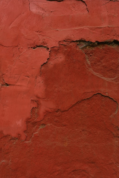 Intonaco sul muro, dipinto in terracotta. Progettare lo sfondo o copiare lo spazio