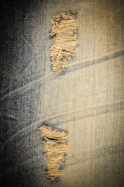 Jeans vintage strappati texture denim.