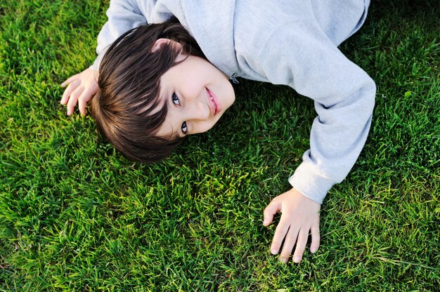 Kid on grass