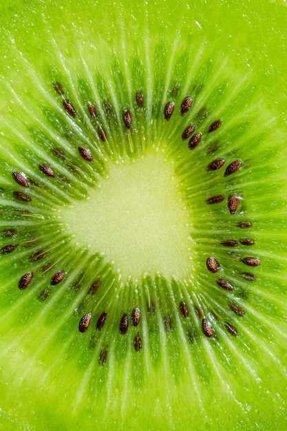 kiwi macro texturesfetta di kiwi su un formato orizzontale full frame