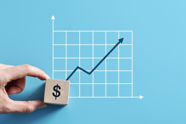 L'icona del dollaro e il grafico di crescita verso l'alto. Simbolo della crescita del dollaro