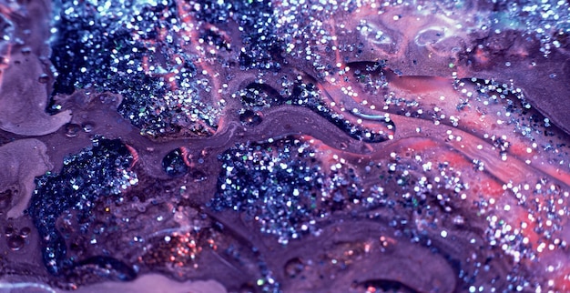 L'inchiostro a flusso di vernice glitter mescola la consistenza bagnata viola