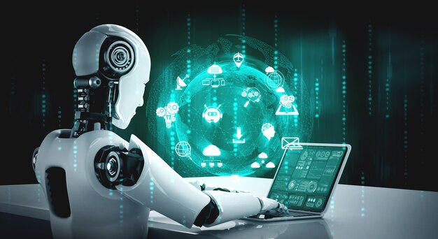 L'umanoide robot usa il laptop e si siede al tavolo per la connessione di rete globale