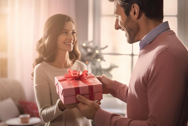 l'uomo tiene in mano la carta da regalo rossa mentre la donna lo guarda nello stile di più