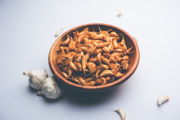 La frittura di aglio o Tala Hua Lahsun in hindi, è un popolare contorno o snack dal Maharashtra, India