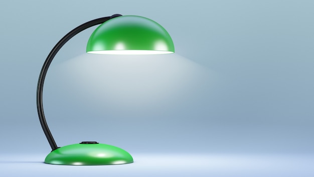 La lampada da tavolo elettrica verde si illumina.
