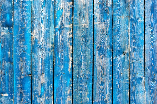 La struttura del blu e del turchese d'annata ha dipinto il fondo di legno