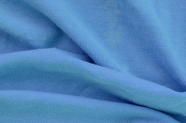 La trama del tessuto in colore blu. Materiale per la realizzazione di camicie e camicette