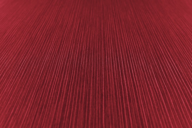 La trama della carta a strisce in una tonalità rossa