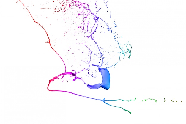 La vernice colorata spruzza isolato su priorità bassa bianca.