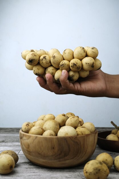 Langsat Fruit è nelle tue mani