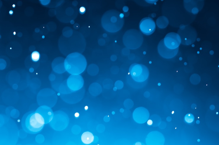 Photo latar belakang abstrak biru tua dengan bokeh.