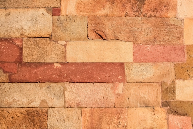 Laterite rossa muro di pietra sullo sfondo di texture.