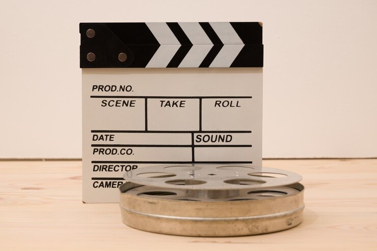 Foto lavagna e rotolo della fotocamera