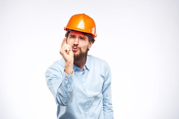 Lavoratori emotivi in vernice arancione sicurezza nell'industria delle costruzioni ufficiale Foto di alta qualità