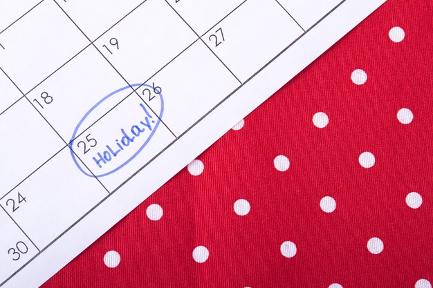 Le festività sono cerchiate in un calendario in attesa di un giorno speciale contrassegnato da un pennarello blu