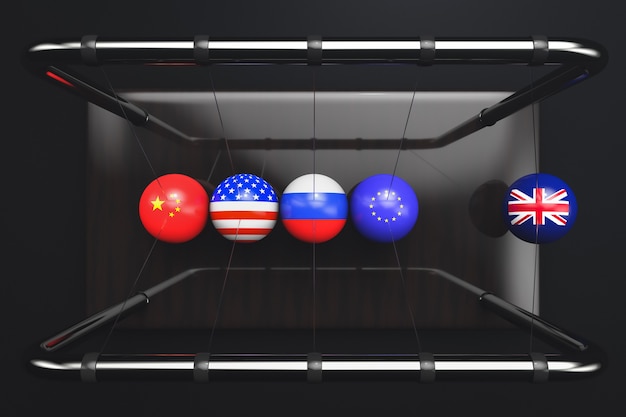 Le palle della culla di Newton con le bandiere della Gran Bretagna, dell'Unione europea, della Russia, degli Stati Uniti e della Cina su sfondo nero