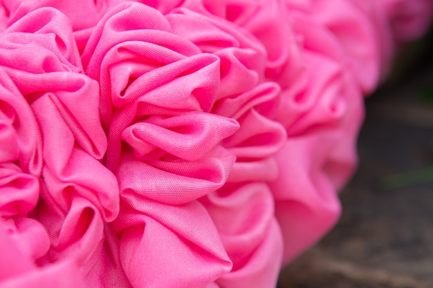 Le tende rosa hanno fatto i fiori, fondo di struttura.