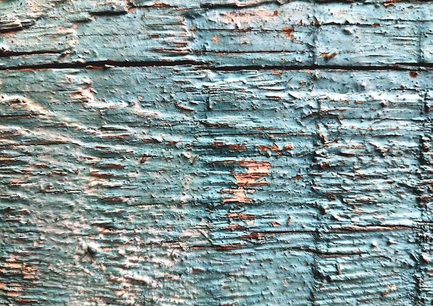 legno antico dipinto. struttura della vernice scrostata.