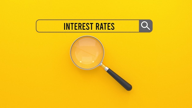 Lente d'ingrandimento, concetto di ricerca web e tassi di interesse.