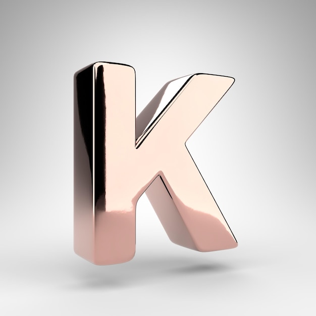 Lettera K maiuscola su sfondo bianco. Carattere 3D renderizzato in oro rosa con superficie cromata lucida.