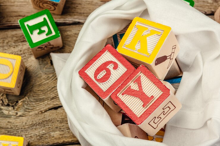 Photo letters. wooden cubes with letters on wooden