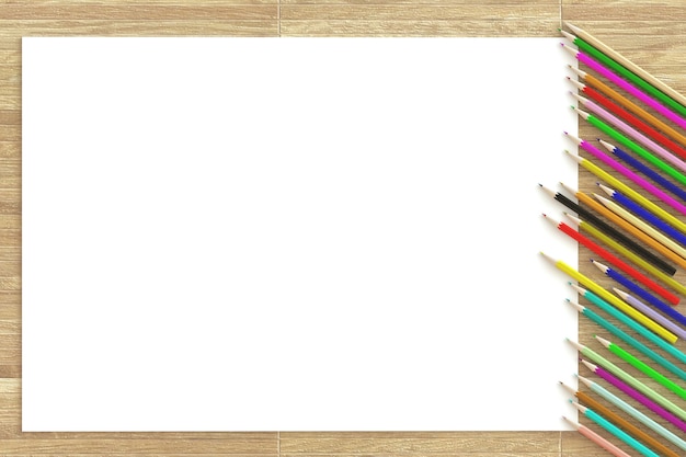 Libro bianco in bianco con la matita di colore sulla tavola di legno