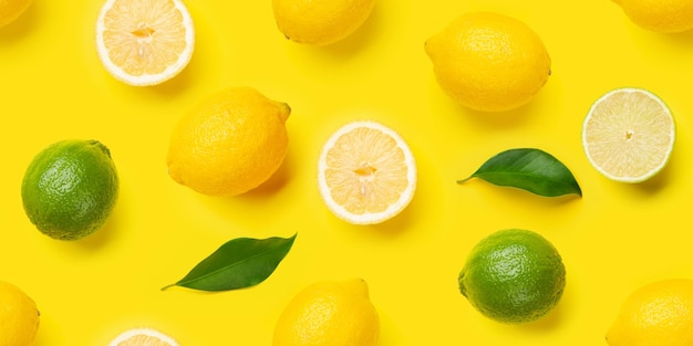 Limone e lime agrumi senza cuciture sullo sfondo